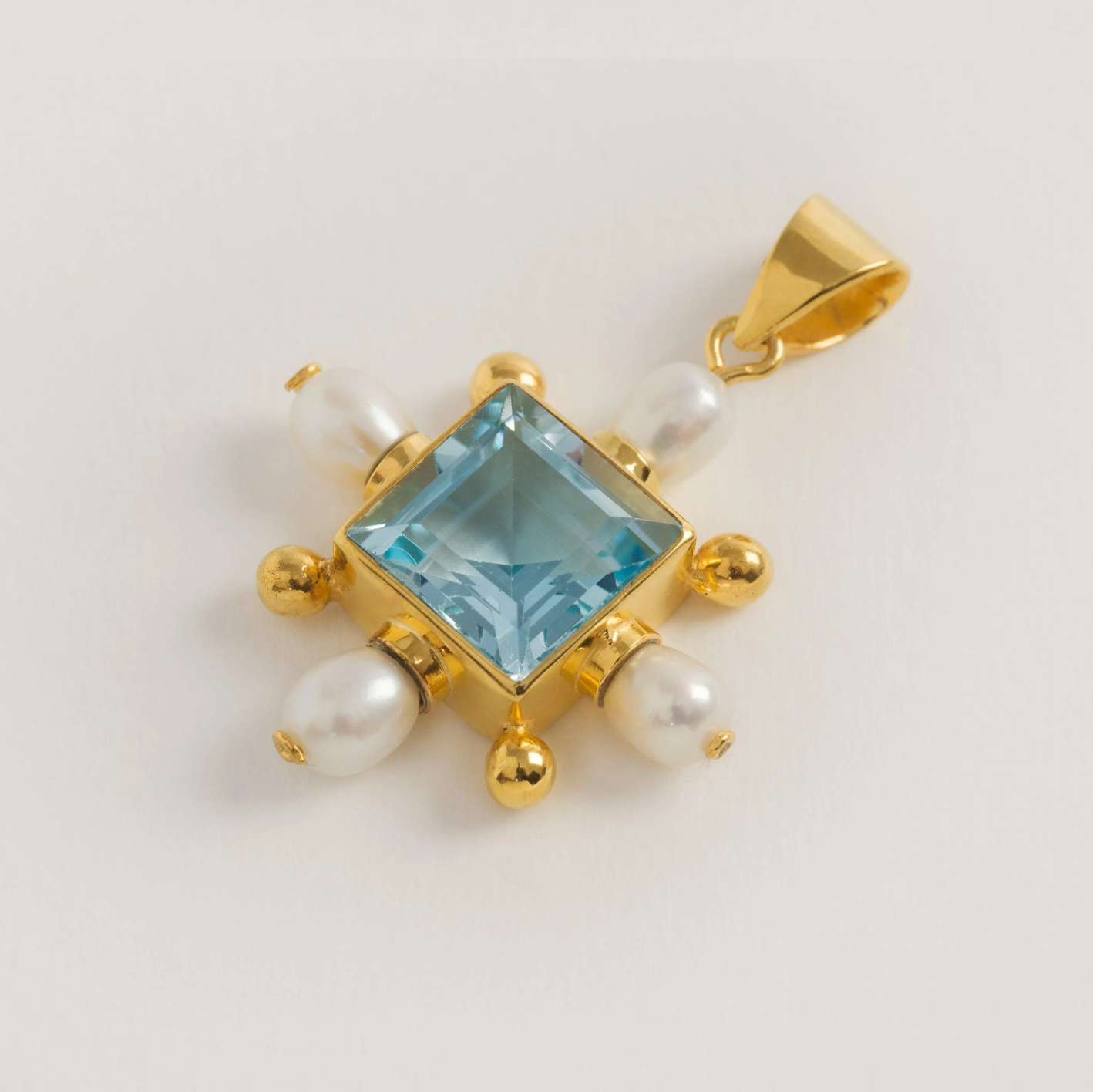 Blue Topaz Cross Pendant - Freya Rose